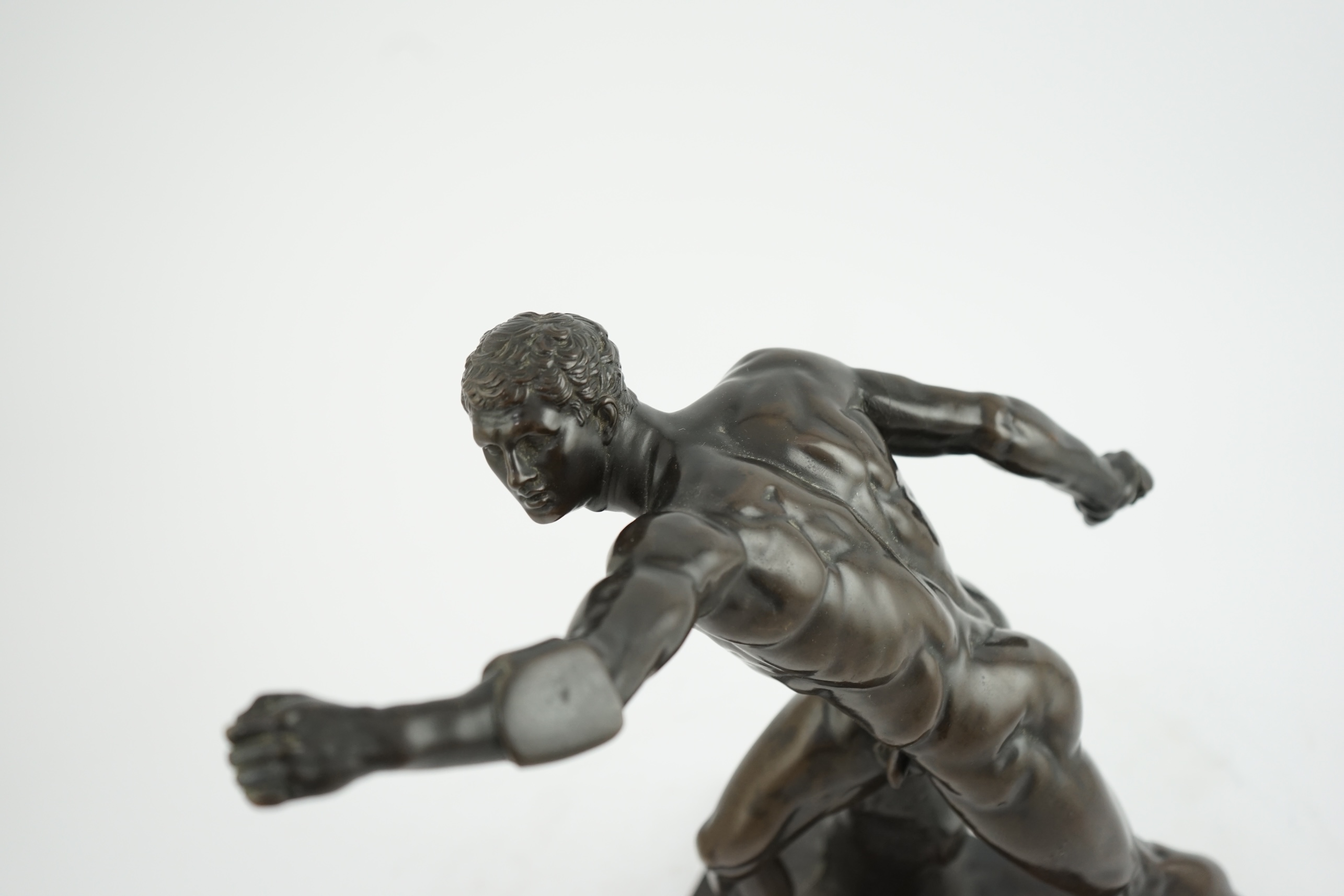 A late 19th century French patinated bronze model of the Borghese Gladiator, after the Antique